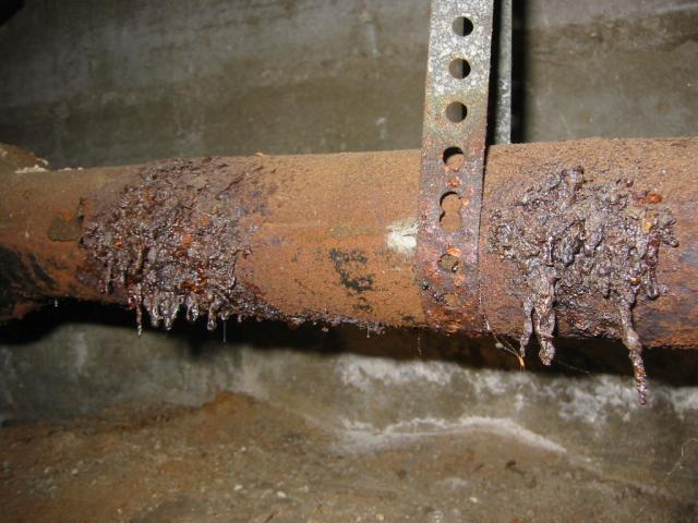 Deteriorated cast iron drain piping