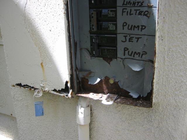 Evidence of water intrusion at electrical panel- Fire hazard